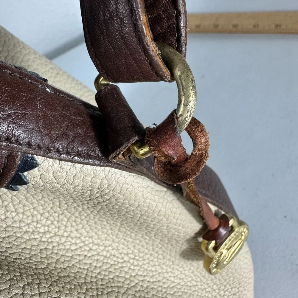 Dooney & Bourke Vintage Teton Bucket Drawstring Bag Purse Leather Ivory Brown